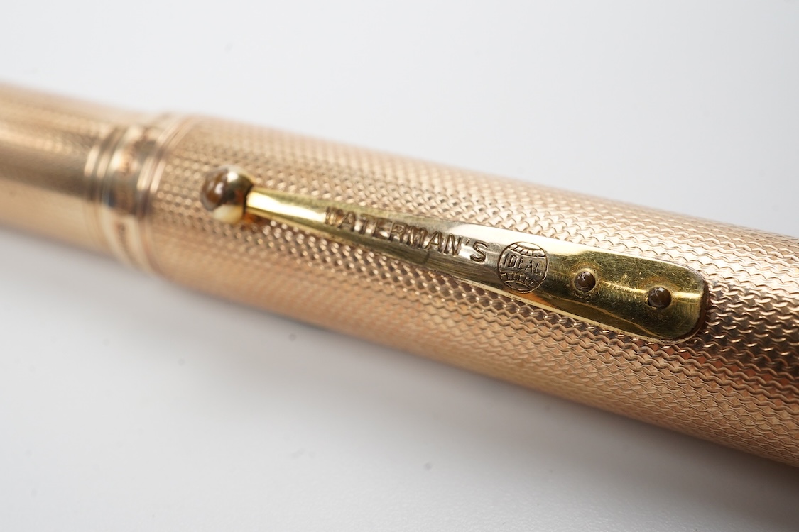 A large Waterman fully covered gold filled fountain pen, lever filler, in fine barley pattern - No.2 Waterman nib